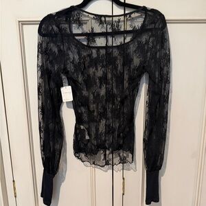 Free People Black Lace Long Sleeve top. NWT Size Medium.
